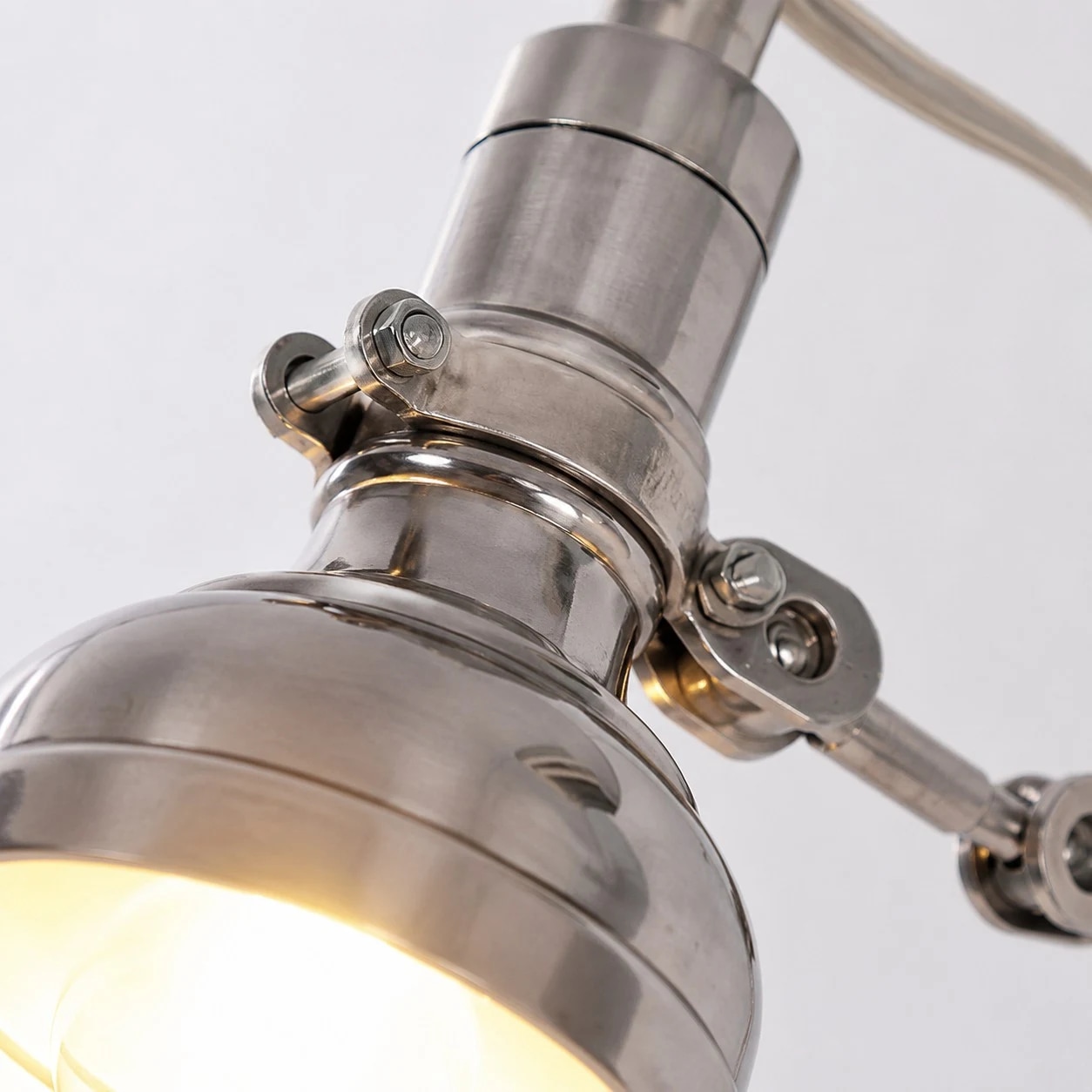 Close-up of the aluminum shade and side adjustment hardware
