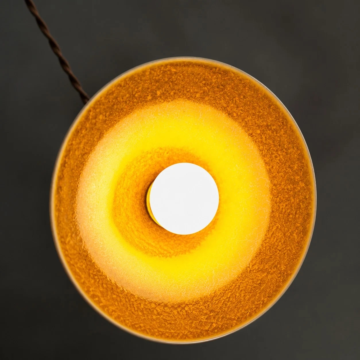 Yellow ceramic glaze underside detail