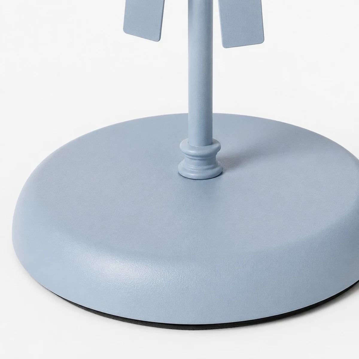 Round painted metal base in pale blue