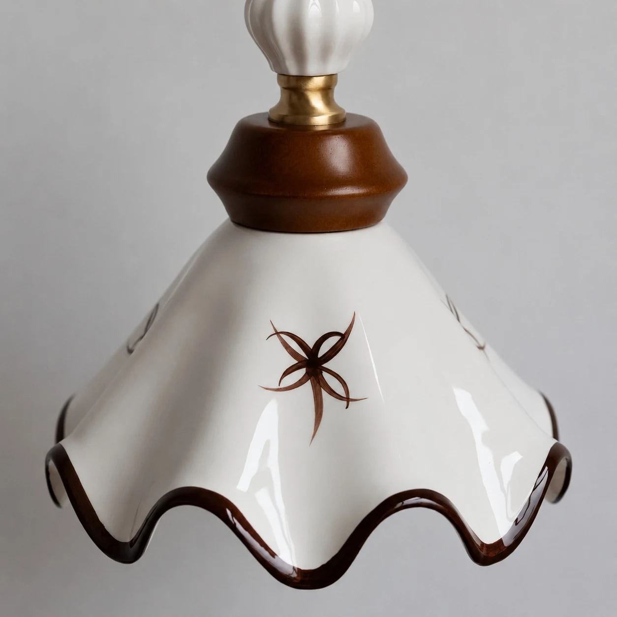 Hand painted scalloped ceramic shade detail