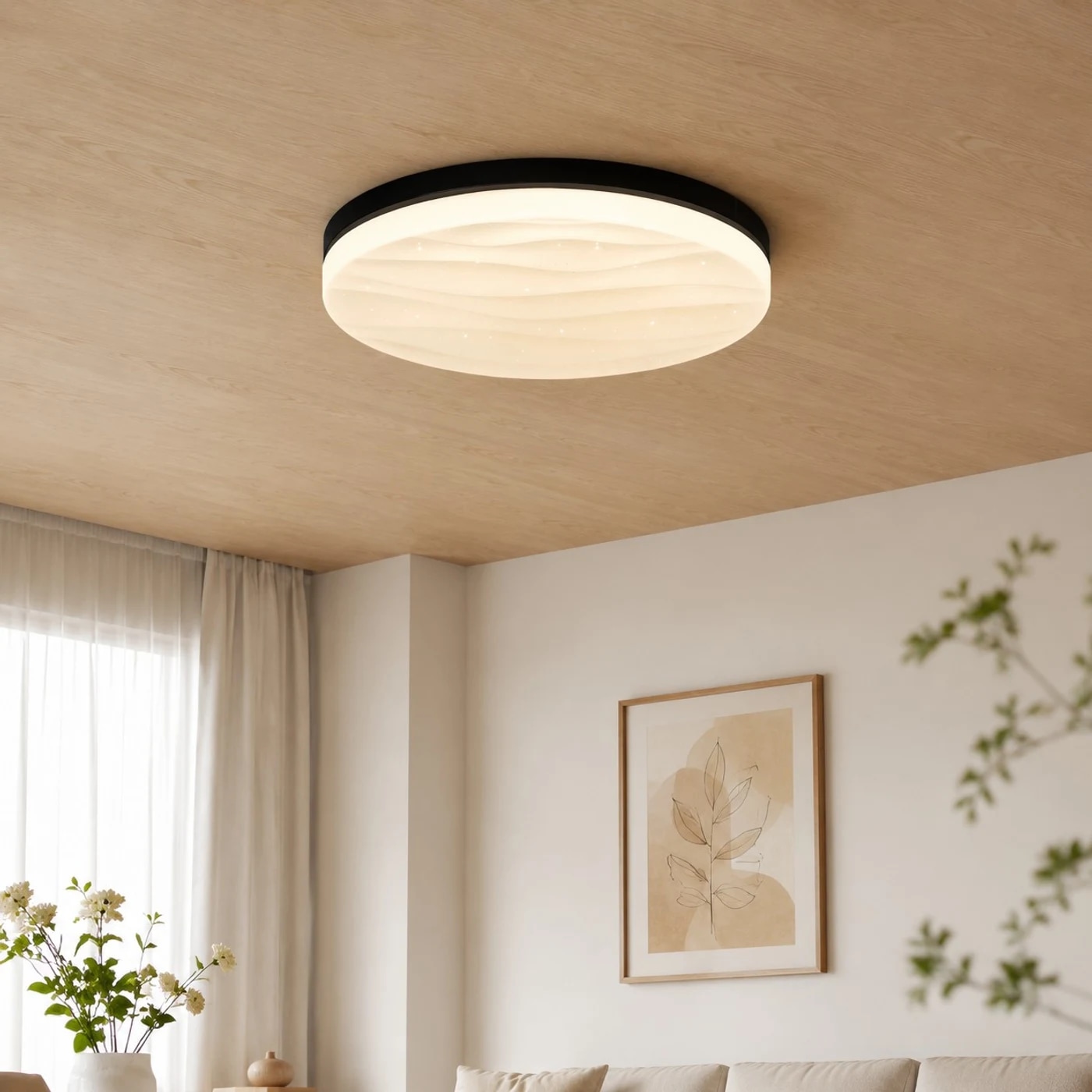 Flush mount ceiling light installed in a calm modern room