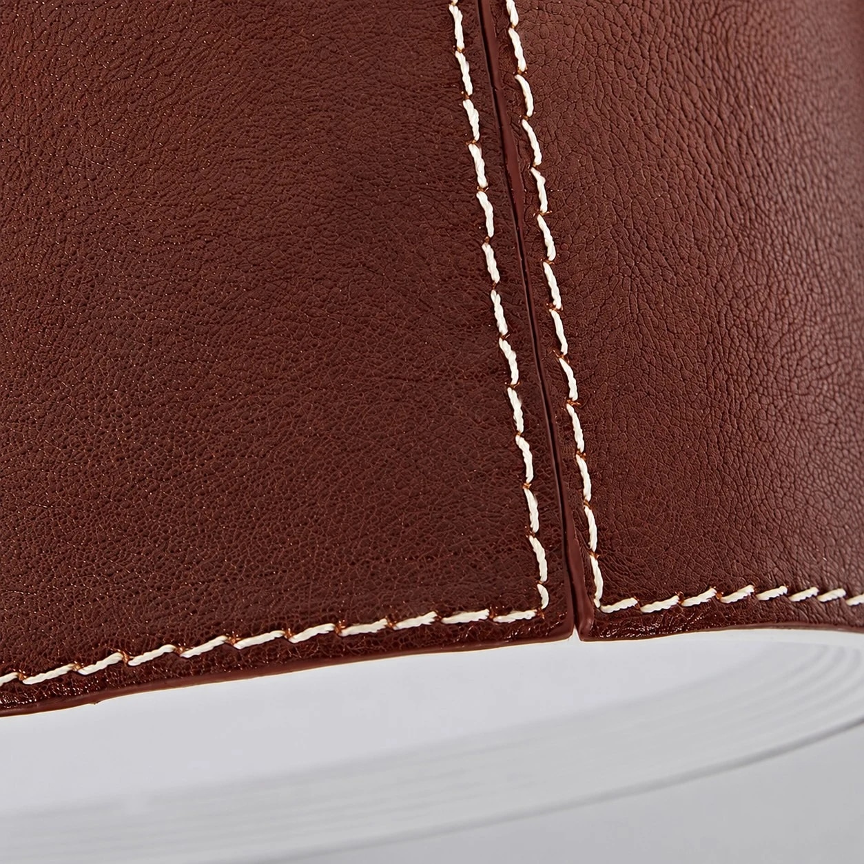 Stitched leather seam close-up