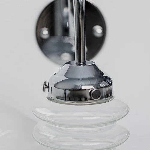 Chrome holder and ribbed glass shade detail