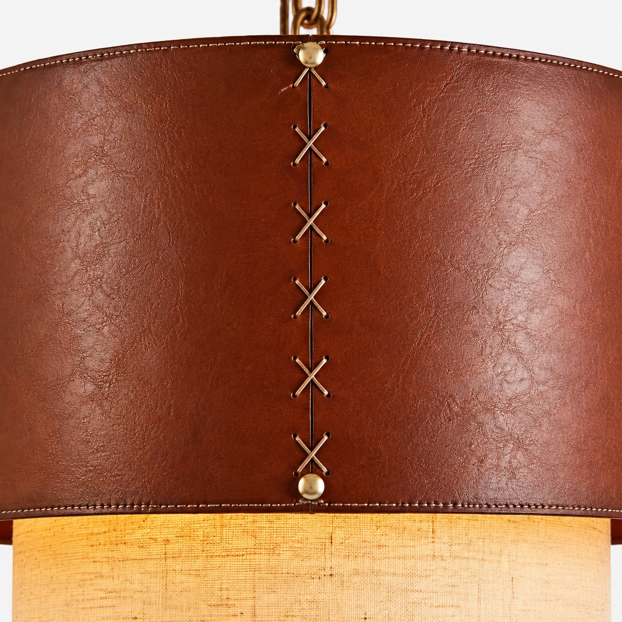 Lower angle detail of the brown leather pendant shade
