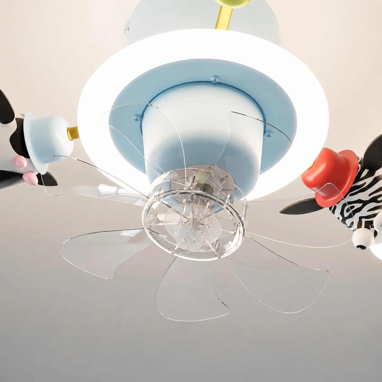 Close view of clear fan blades and blue ceiling hub