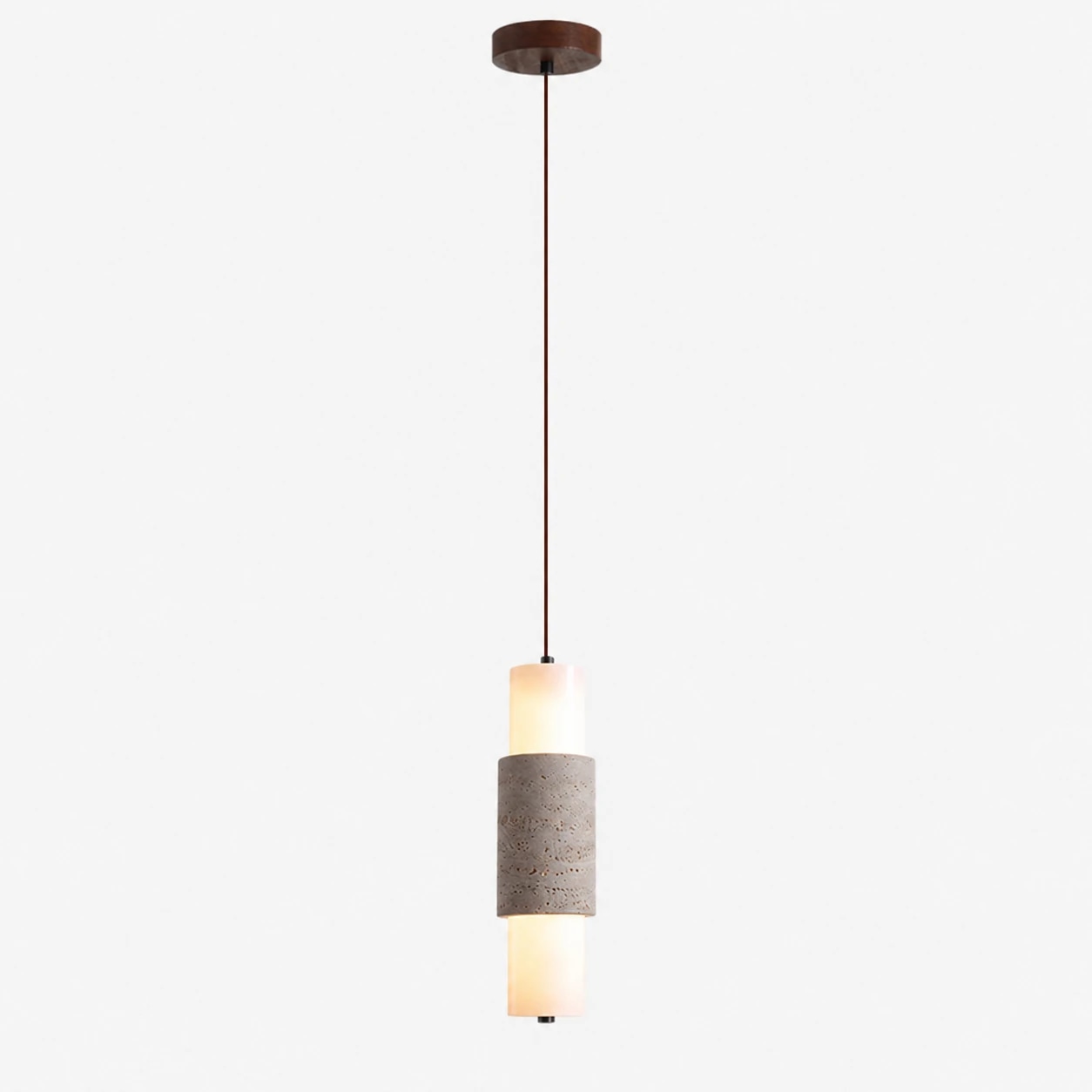 Full drop view of the slim travertine pendant lamp and ceiling canopy