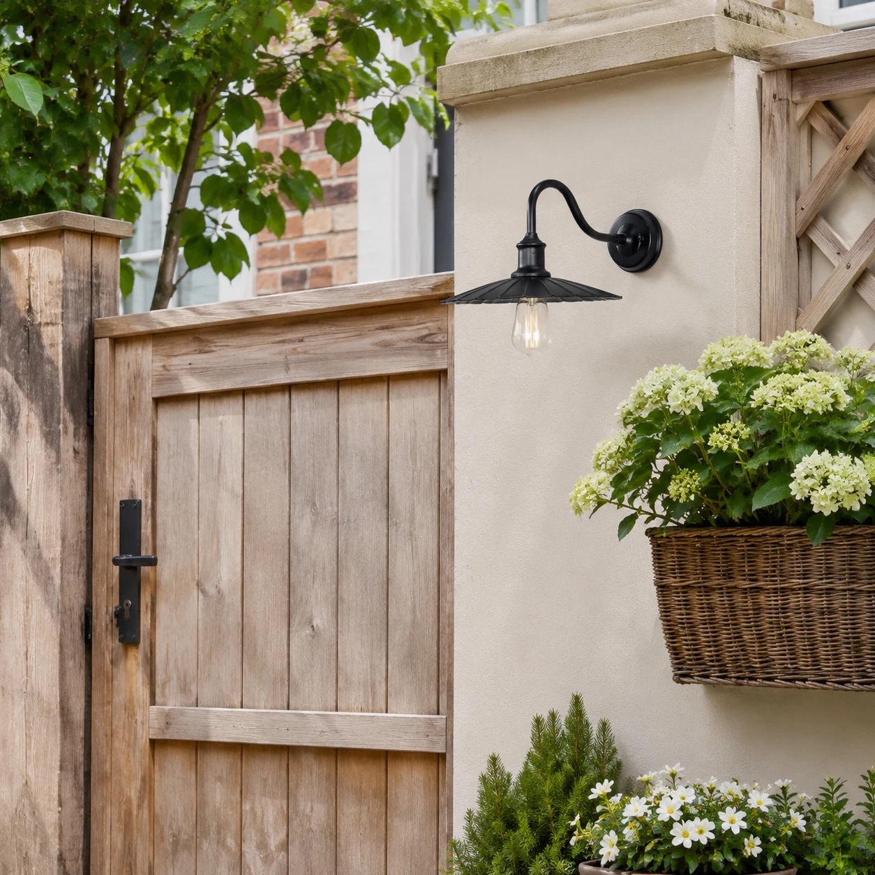 Outdoor wall lamp on a garden gate wall