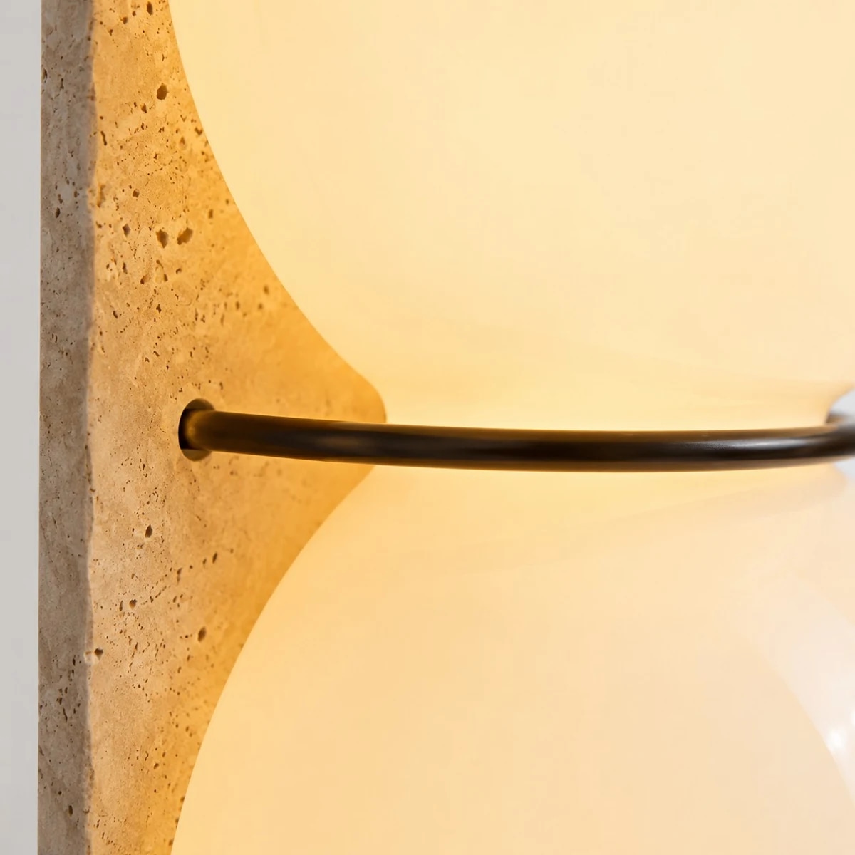 Rounded glass forms create a softer architectural outline