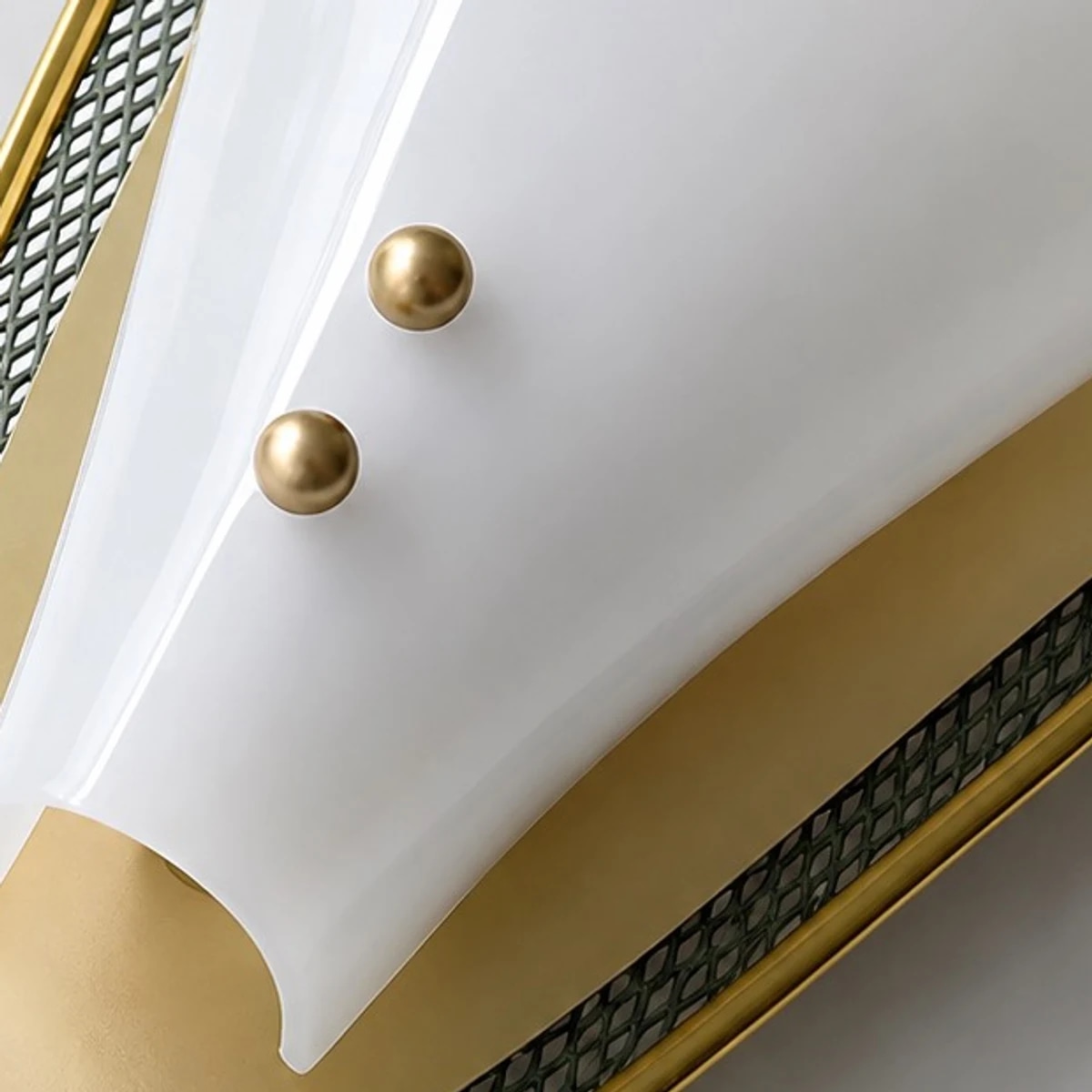 Brass-tone buttons on acrylic shade