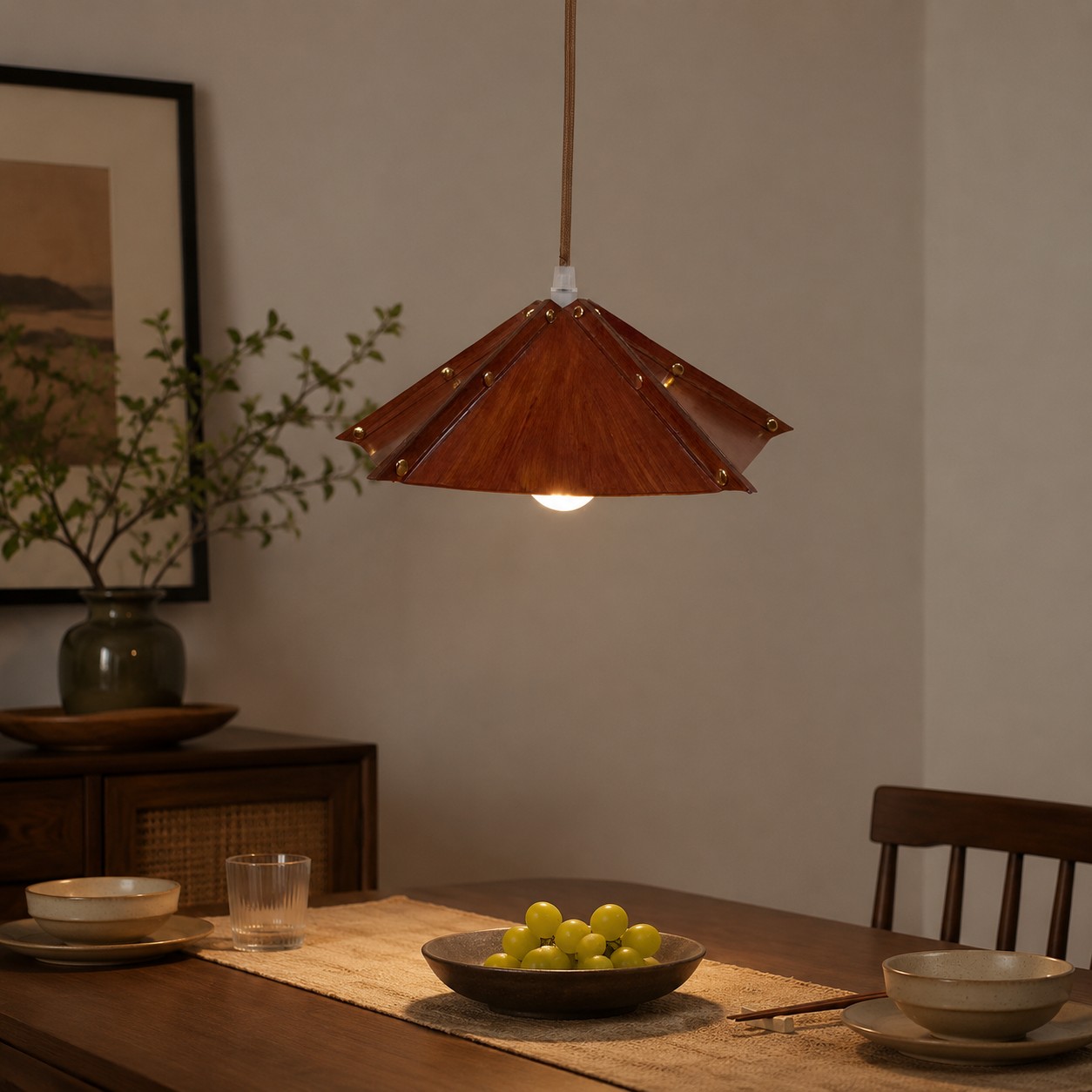 Brown leather pendant lamp over a dining table
