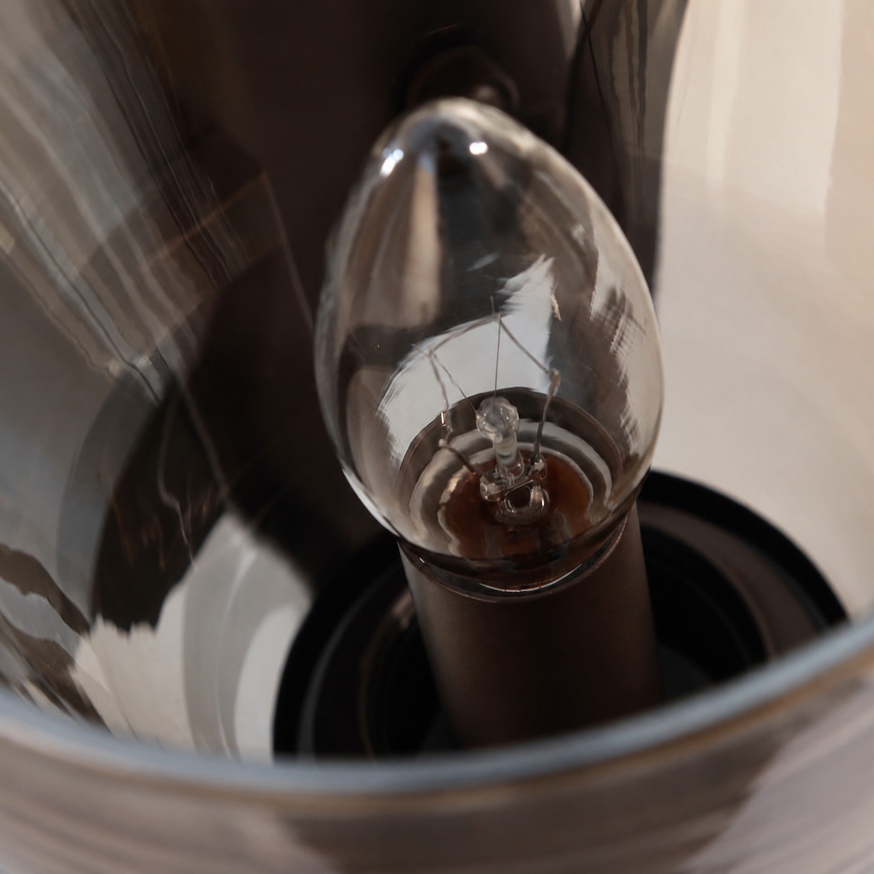 Bulb placement inside amber glass shade