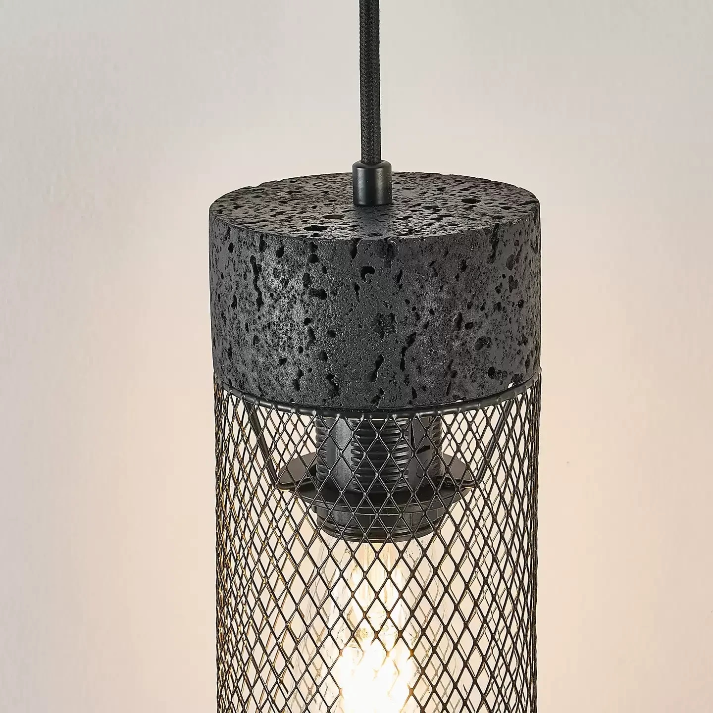 Close view of black stone top and mesh shade