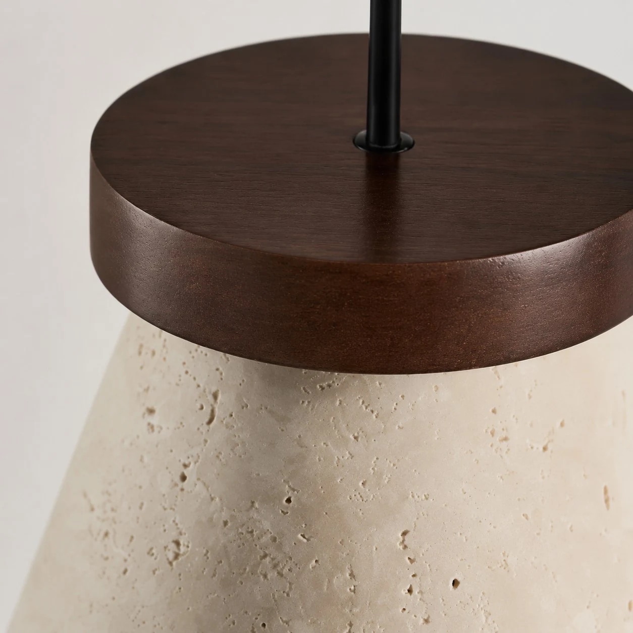 Dark wood-tone cap and stone shade connection