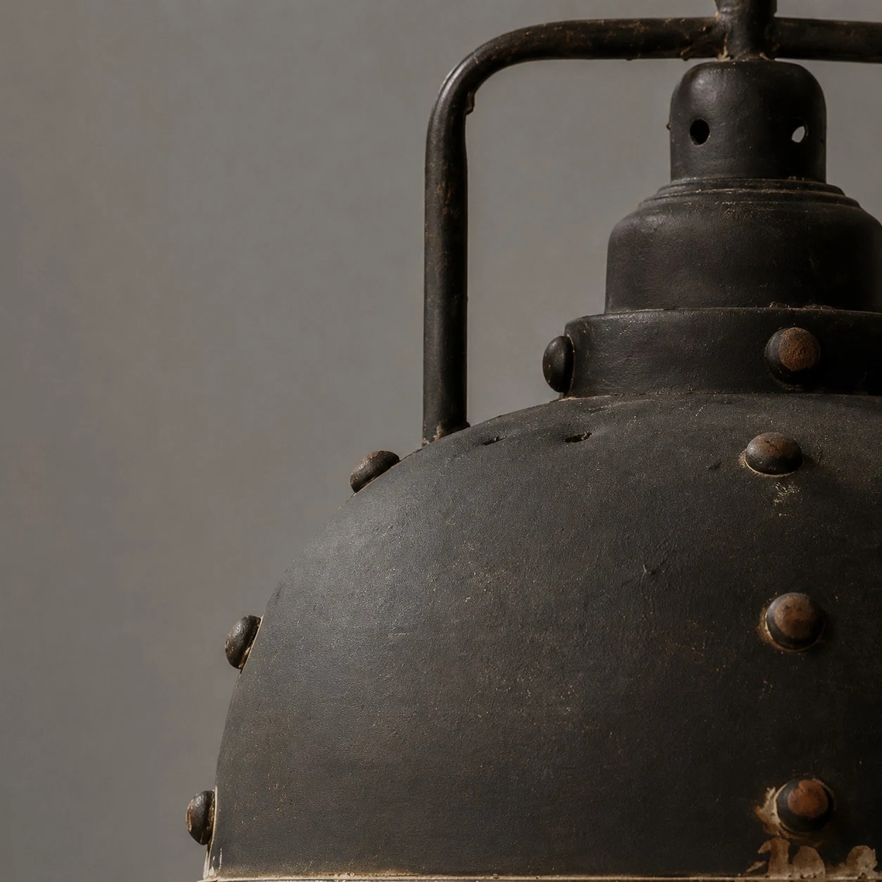 Aged metal texture, rivet detail and a softly weathered interior.
