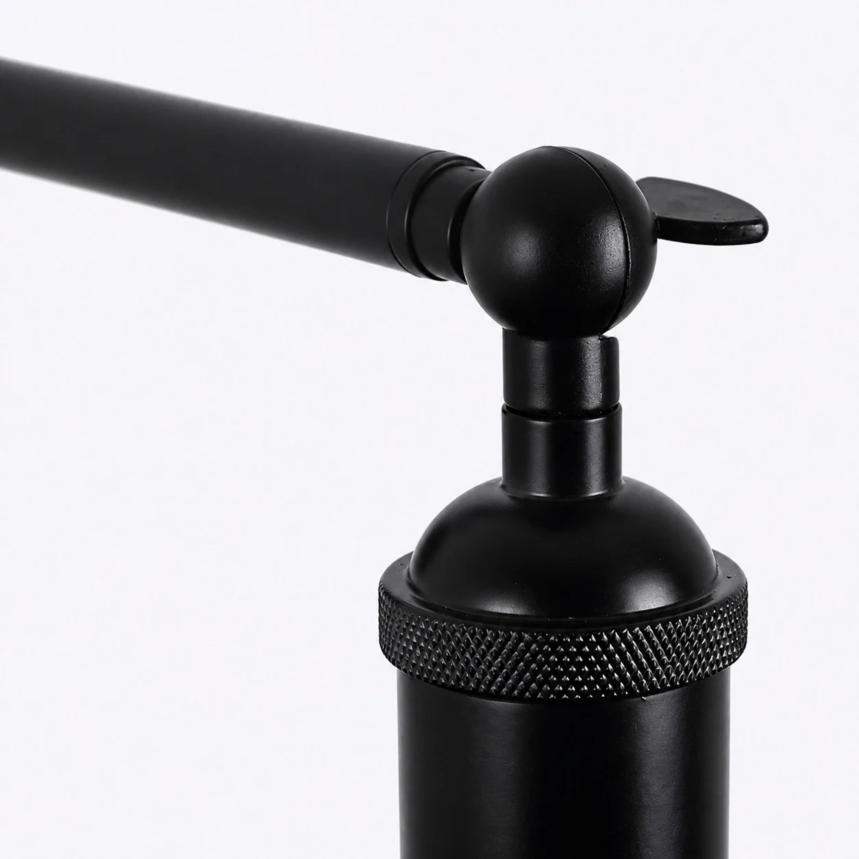 Adjustable black metal joint detail