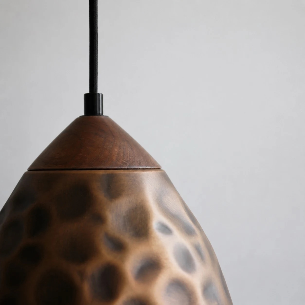 Close hammered antique copper pendant texture