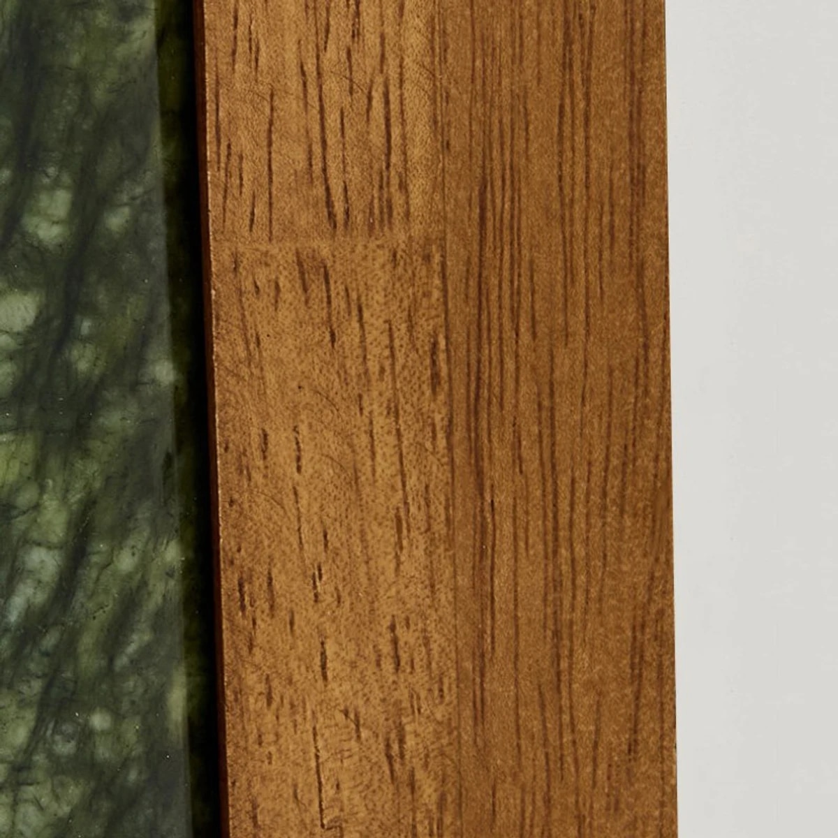 Green jade and wood back detail on wall lamp