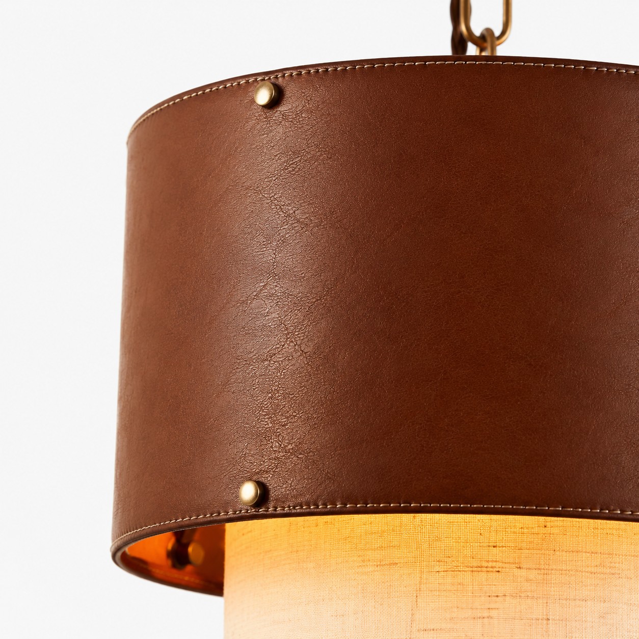 Brass metal hardware detail on the leather pendant light