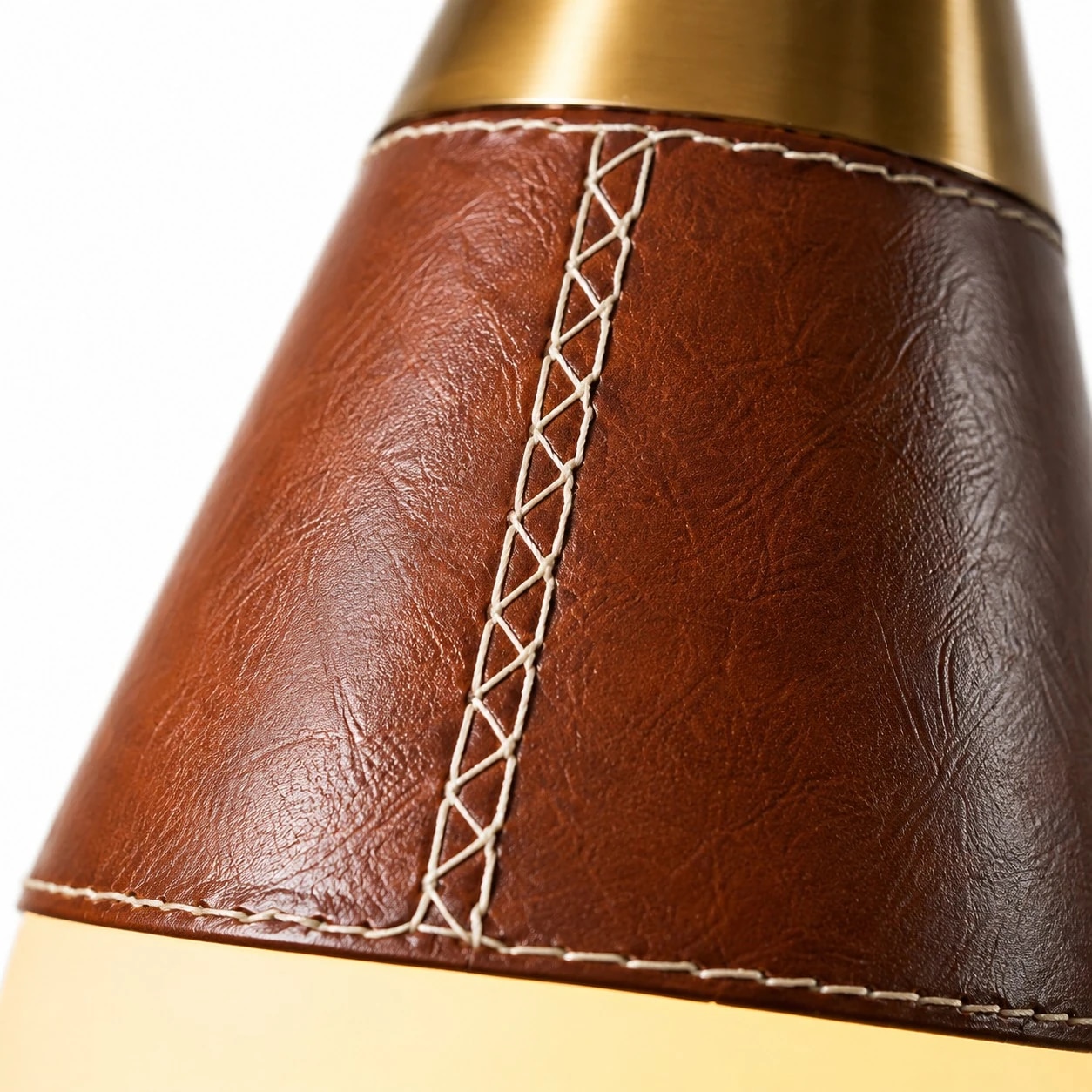 Brown leather wrap with visible stitching on the teardrop pendant light