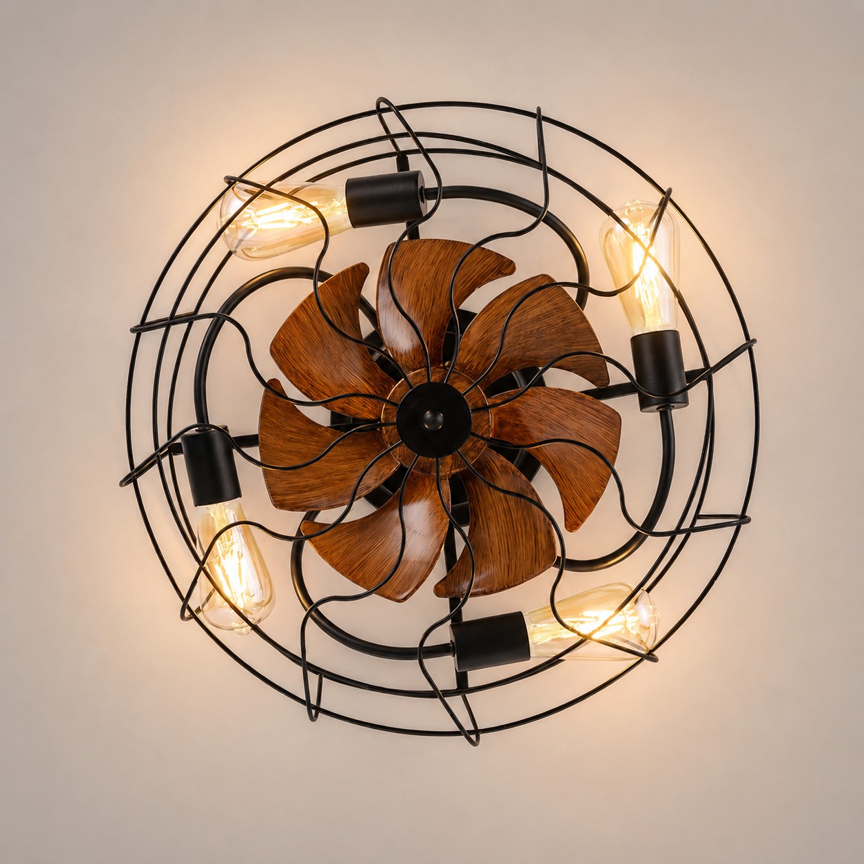 Dettaglio superiore del ventilatore a soffitto con griglia e luce a LED a luce calda.