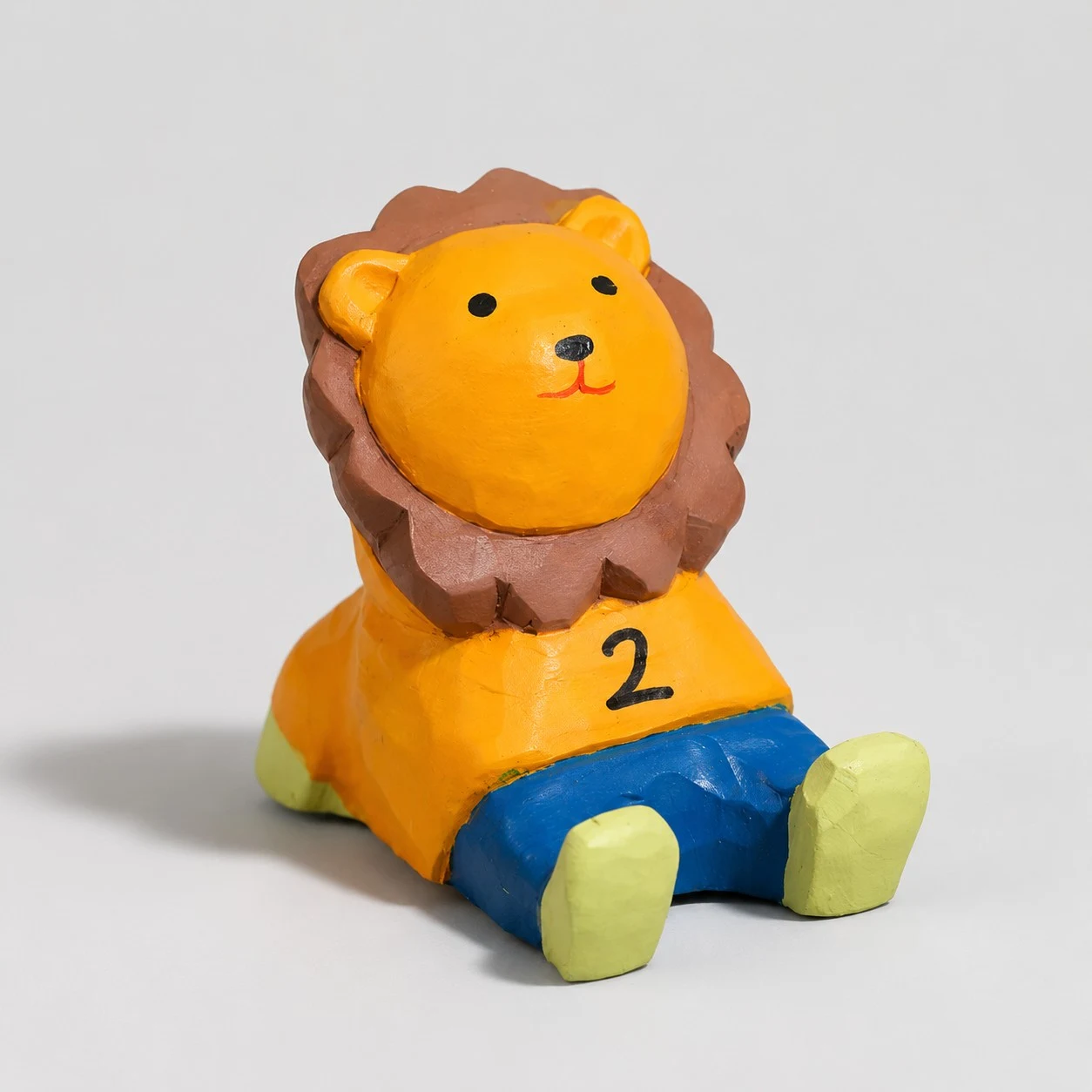 Support de téléphone en bois sculpté à la main, motif lion n° 2