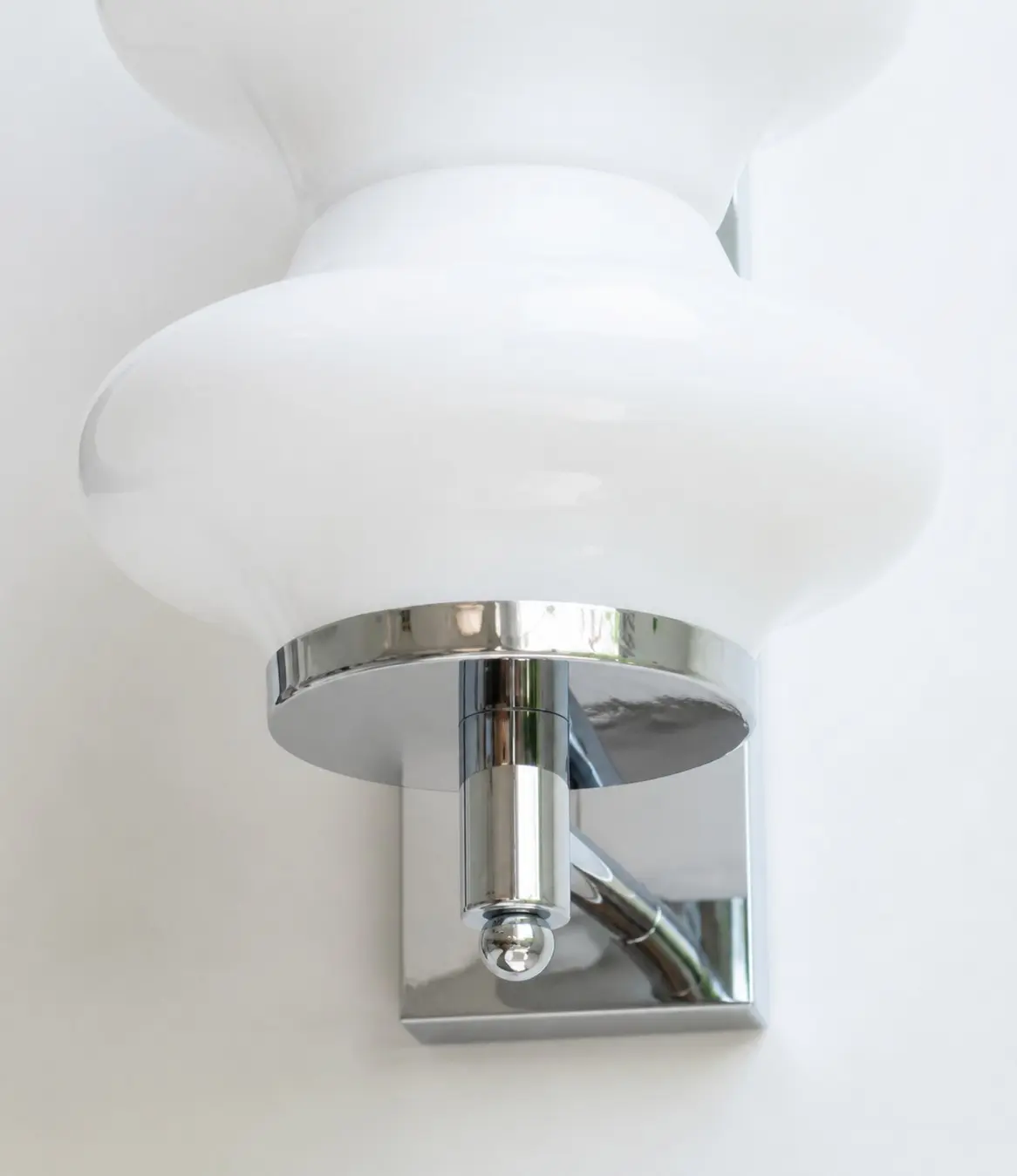 Lower glass and chrome fixture detail