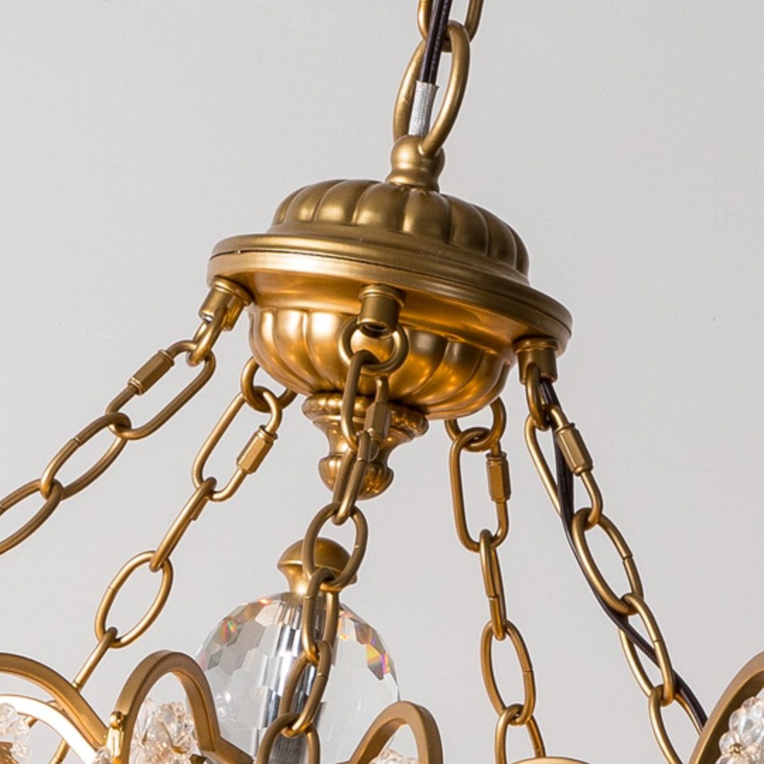 Decorative chandelier crown with supporting chains