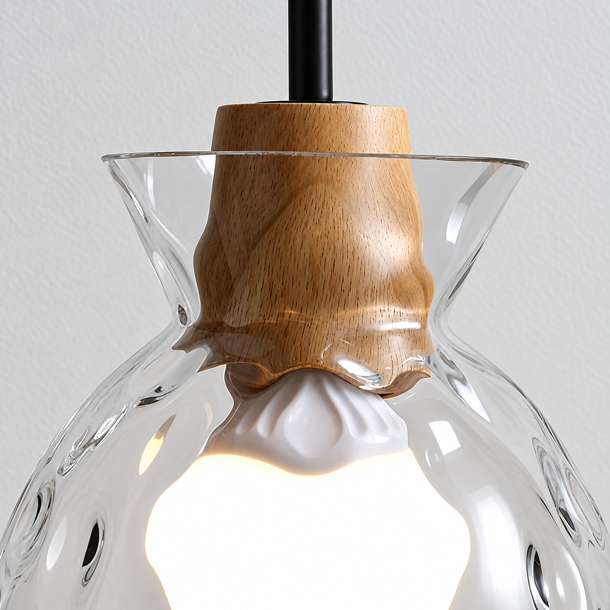 Close view of the natural wood center above the illuminated bulb