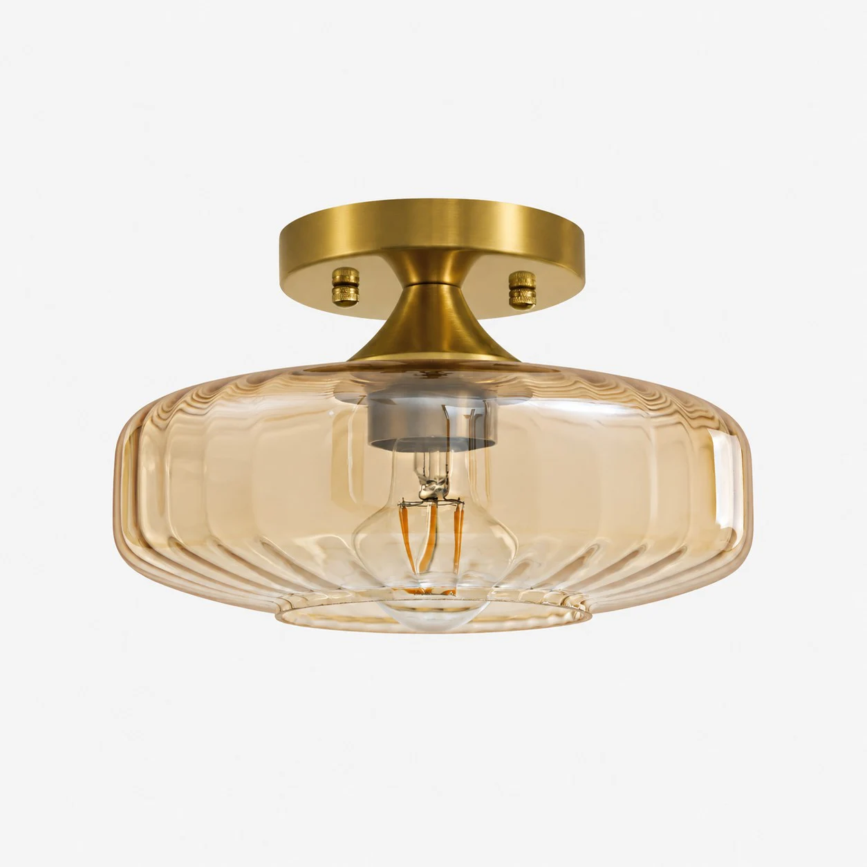 Plafonnier semi-encastré en verre nervuré ambré avec rosette en laiton brossé