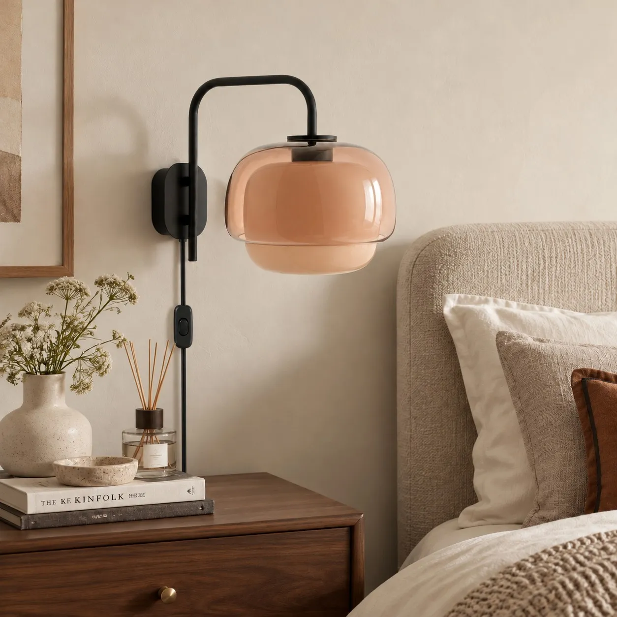 Peach flower-shaped resin wall lamp beside a bed