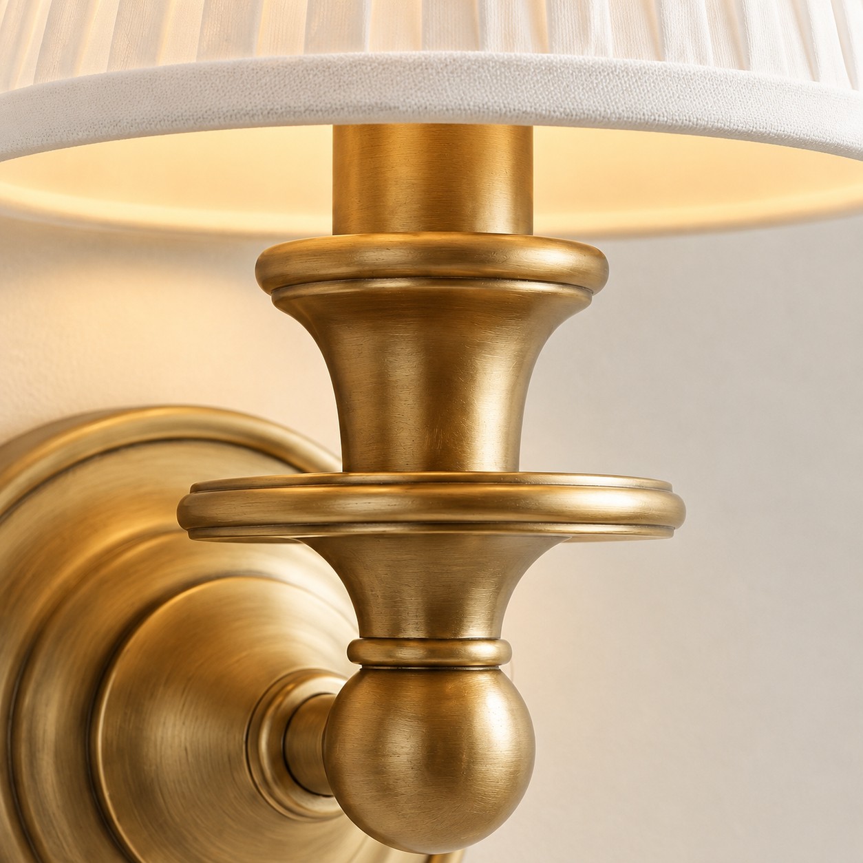 Brushed brass stem, cup, disc, and backplate