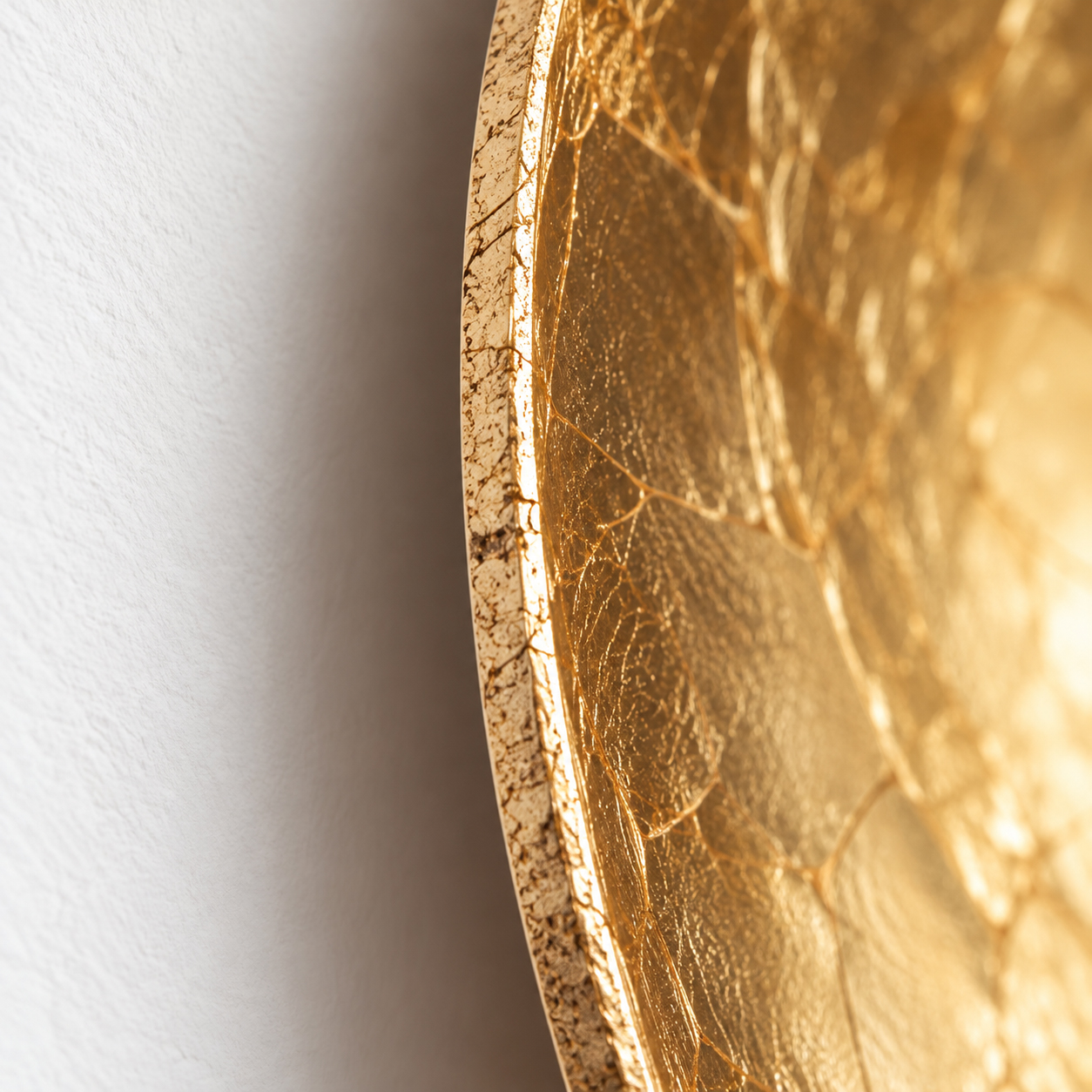 Gold-leaf edge of the metal backplate; original product photograph