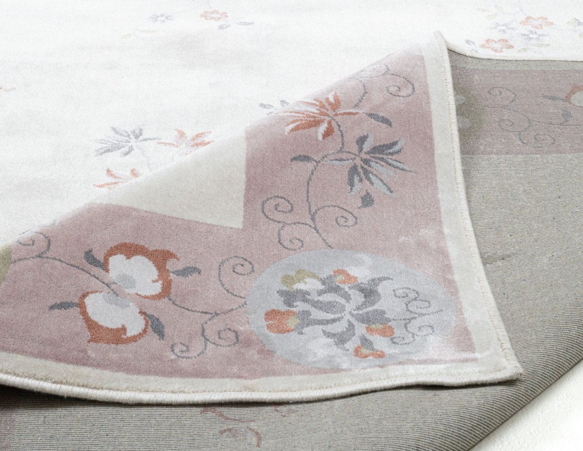 Tapis tissé avec bordure et motif floral avec effet brillant - Cherina