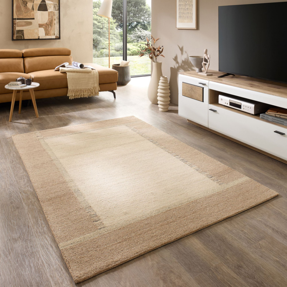 Tapis en laine tufté main aux couleurs douces et bordures