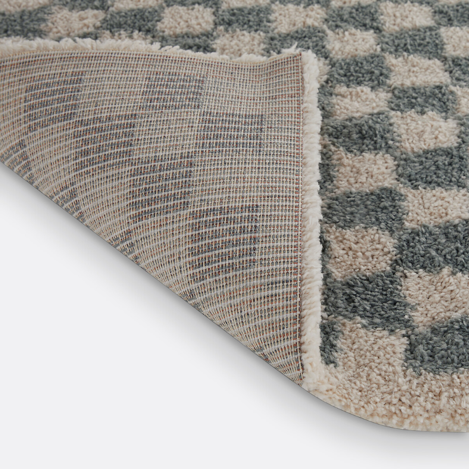 Tapis damier, Eras