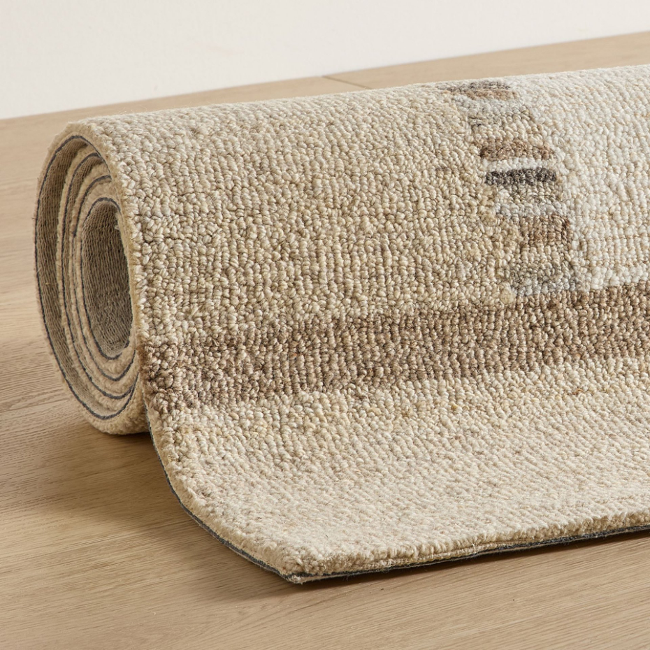 Tapis en laine tufté main aux couleurs douces et bordures