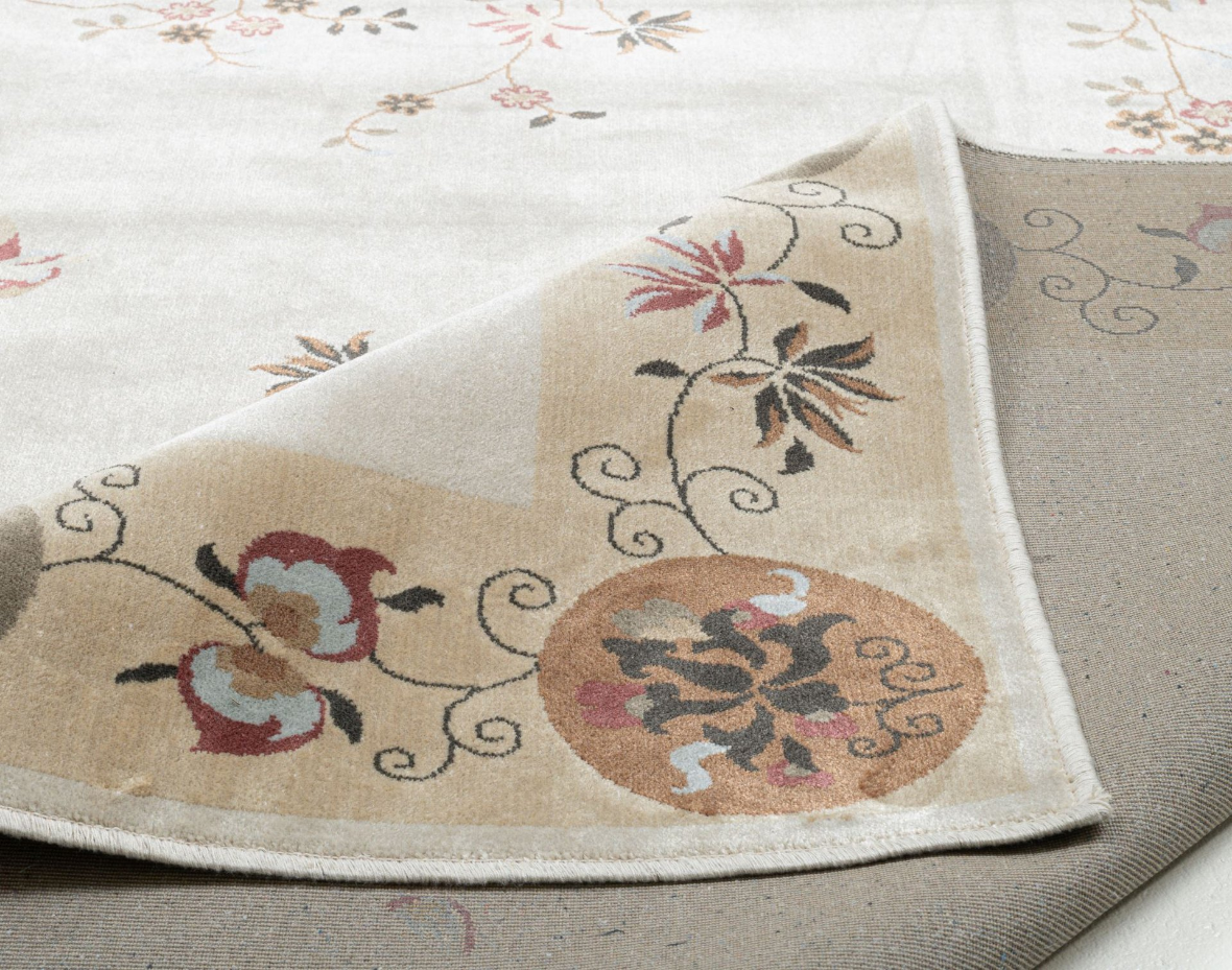 Tapis tissé avec bordure et motif floral avec effet brillant - Cherina