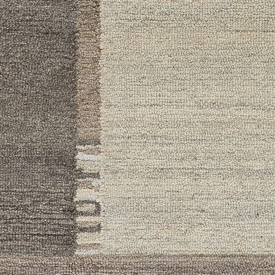 Tapis en laine tufté main aux couleurs douces et bordures