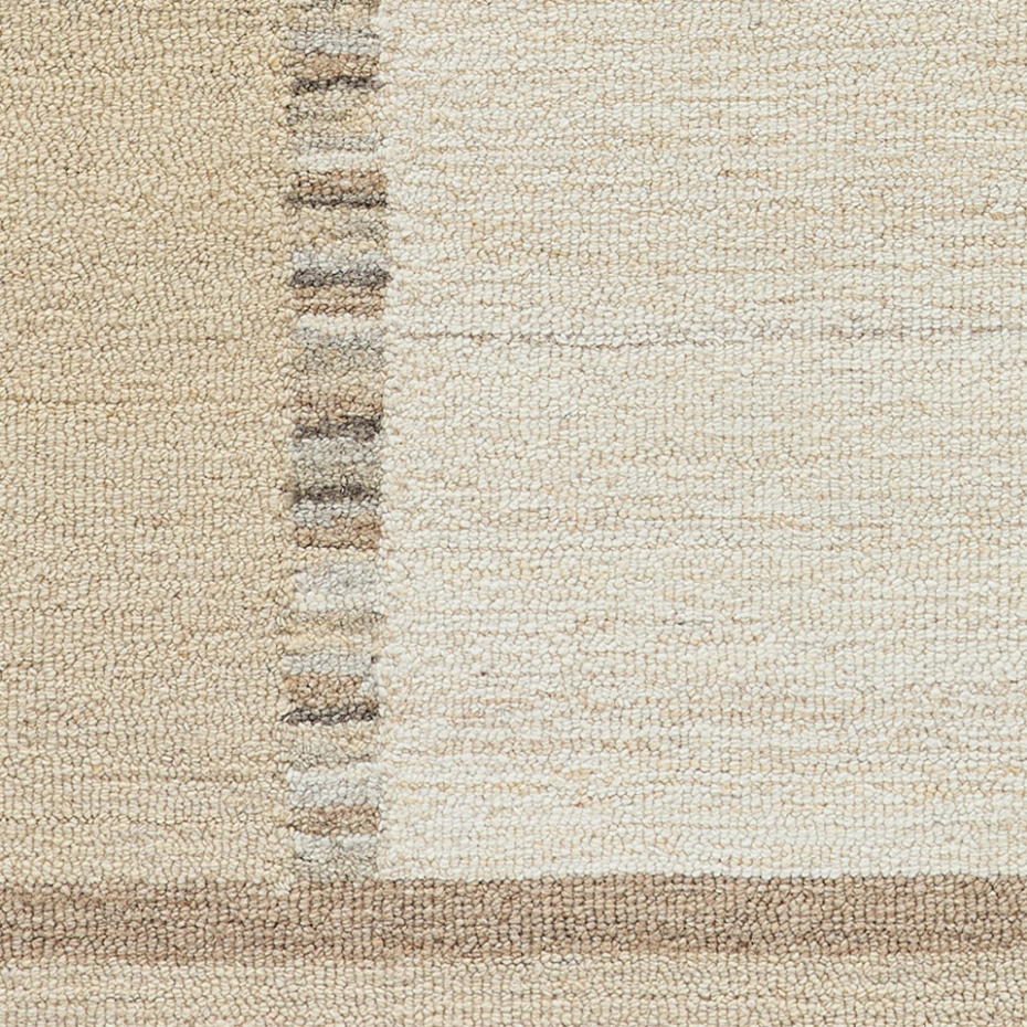 Tapis en laine tufté main aux couleurs douces et bordures