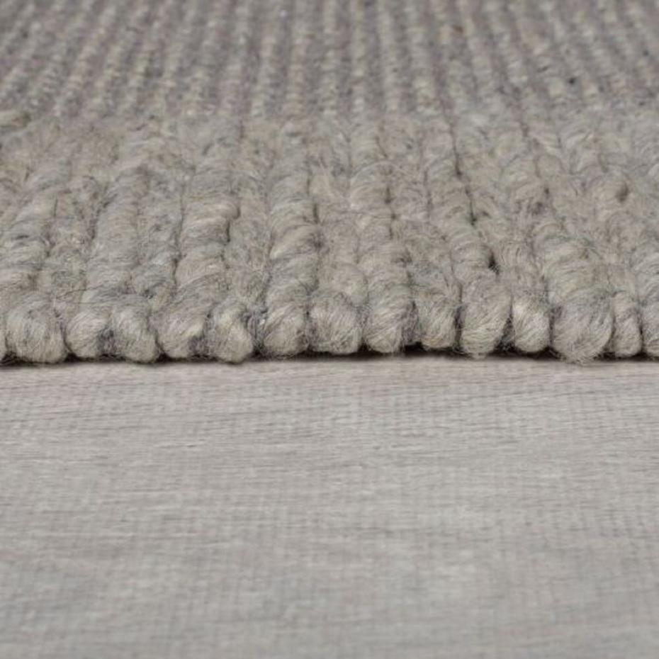 Tapis salon et chambre design tressé en laine PILAT