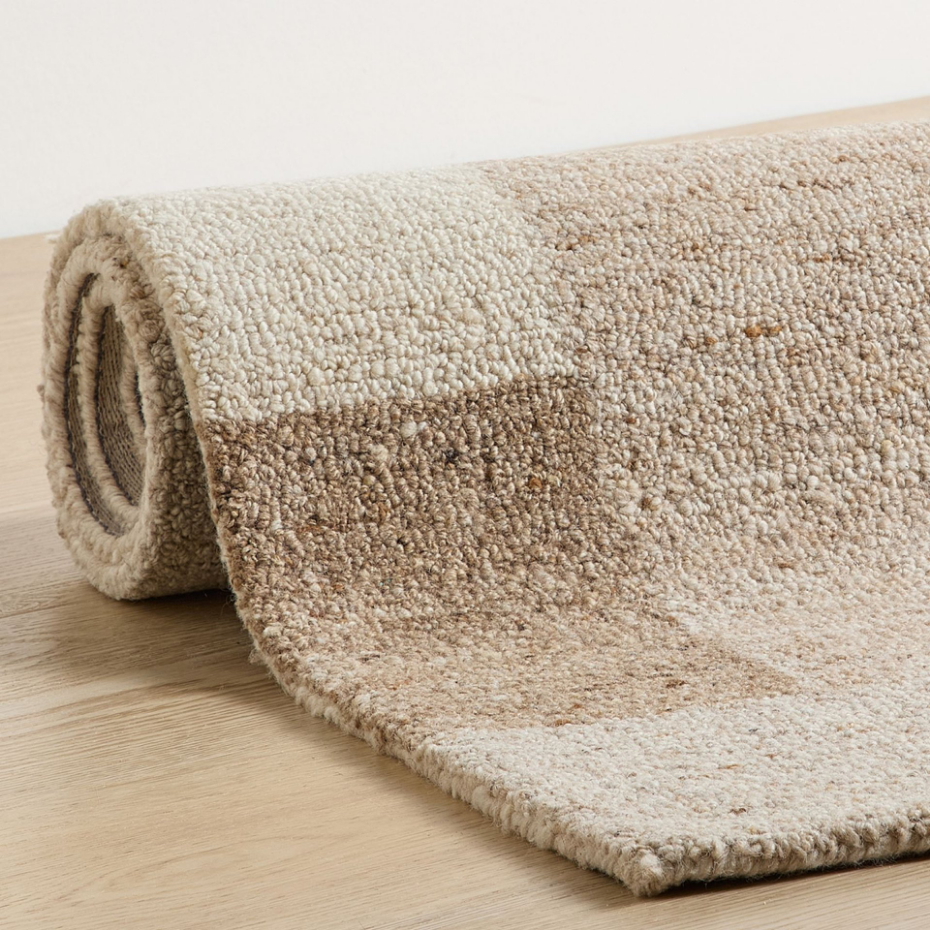 Tapis en laine tufté main aux couleurs douces et bordures