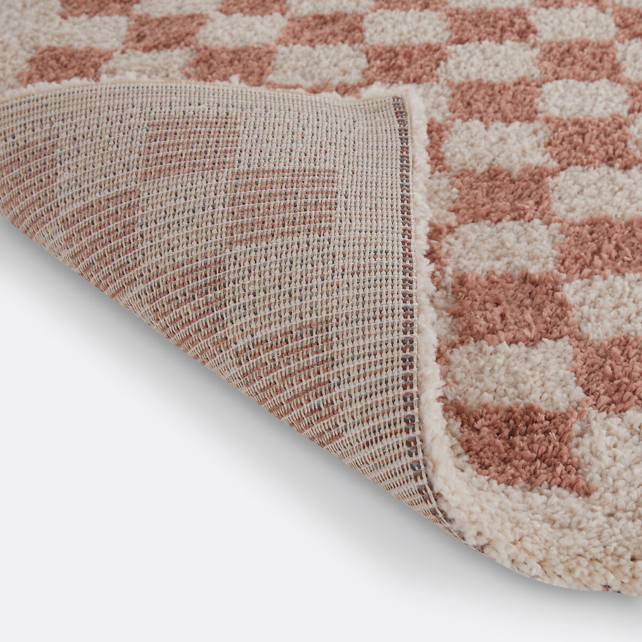 Tapis damier, Eras