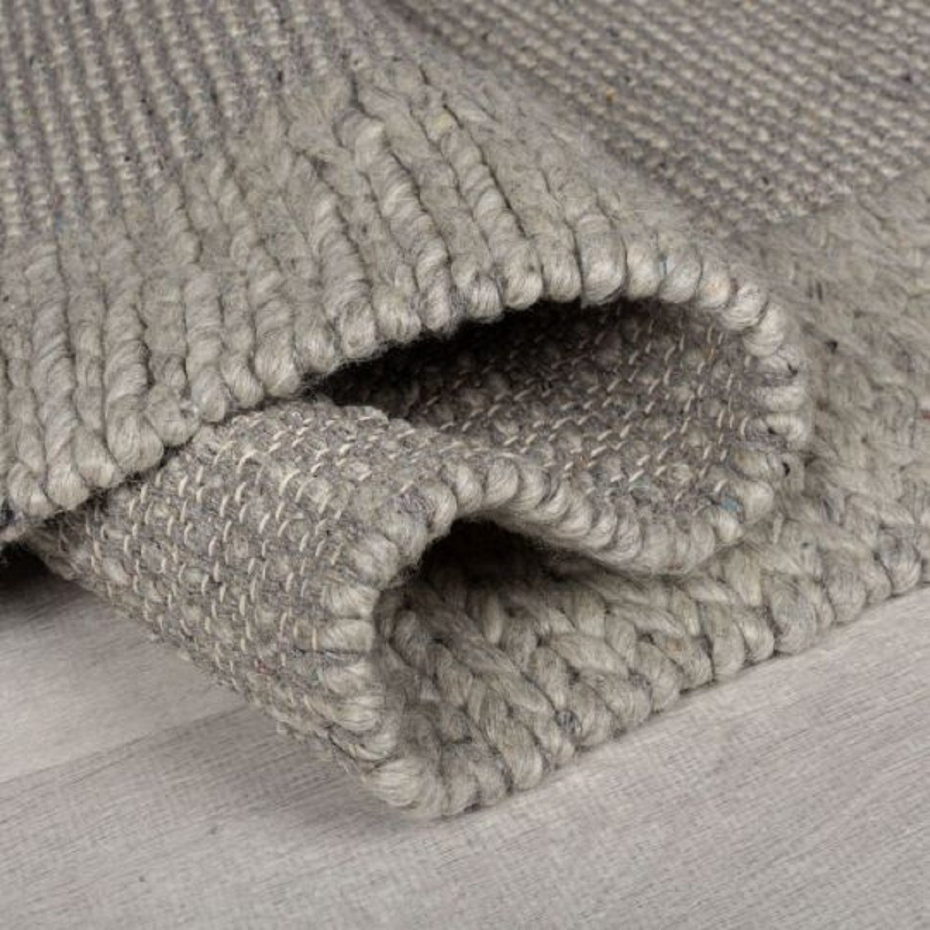 Tapis salon et chambre design tressé en laine PILAT