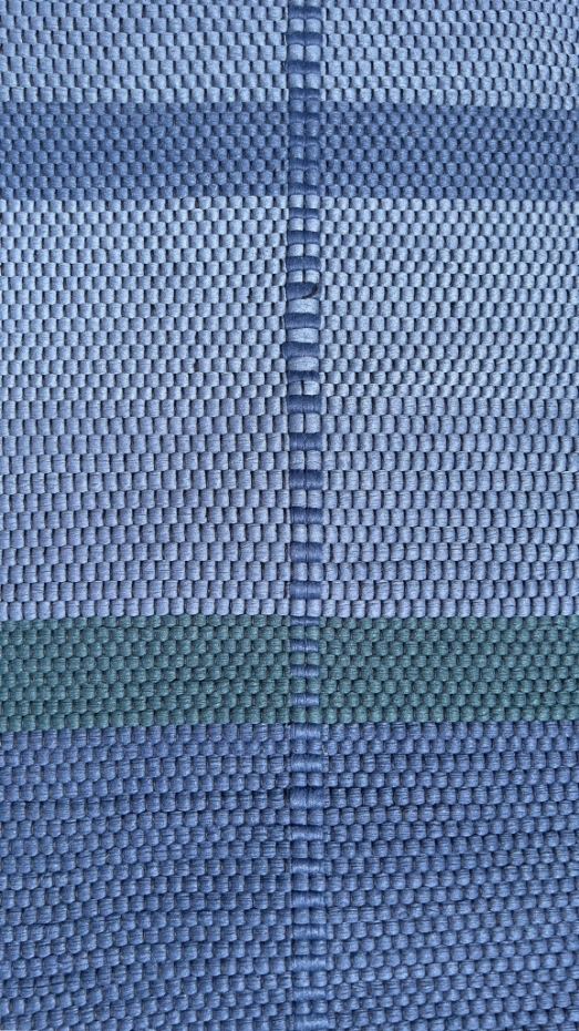 Tapis en fibres recyclées tissé à la main LEONOR