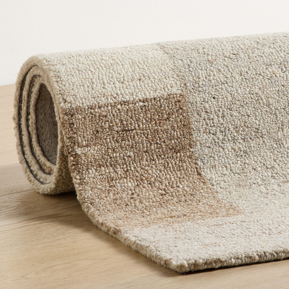 Tapis en laine tufté main aux couleurs douces et bordures