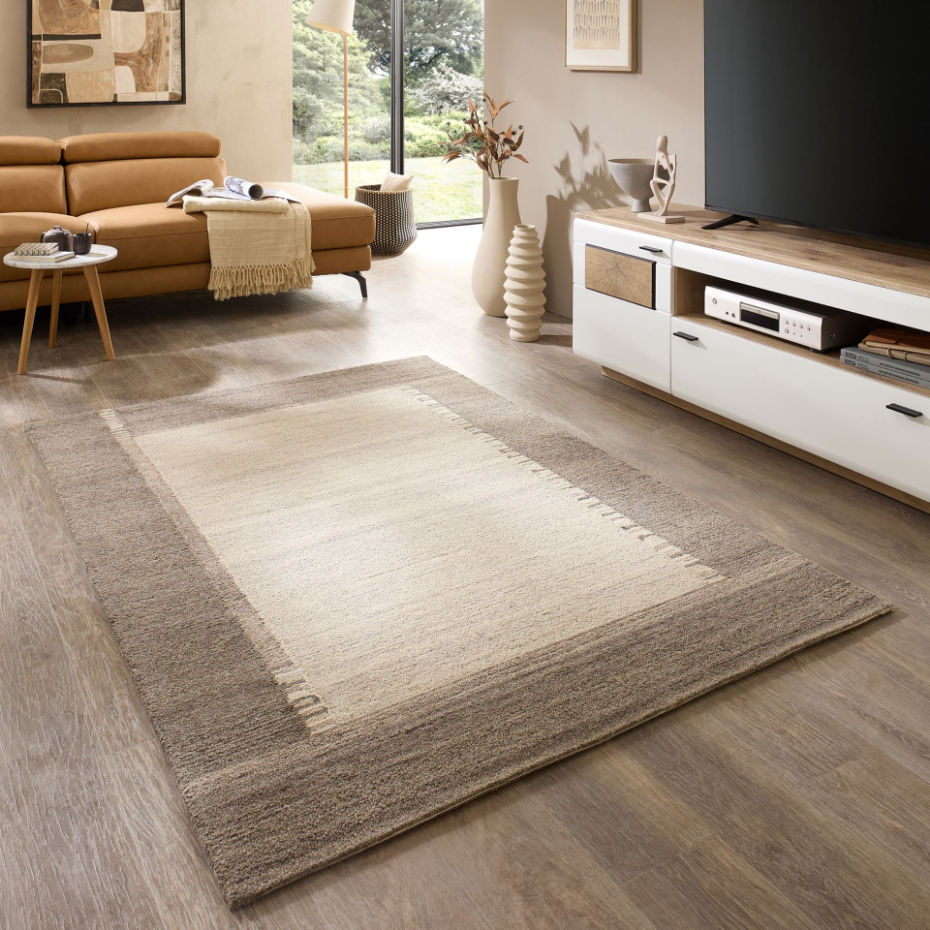 Tapis en laine tufté main aux couleurs douces et bordures