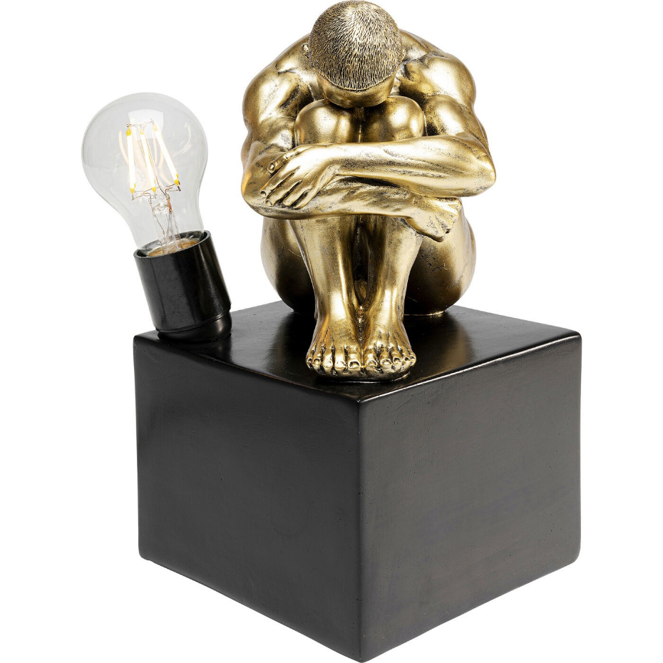 Lampe homme recroquevillé