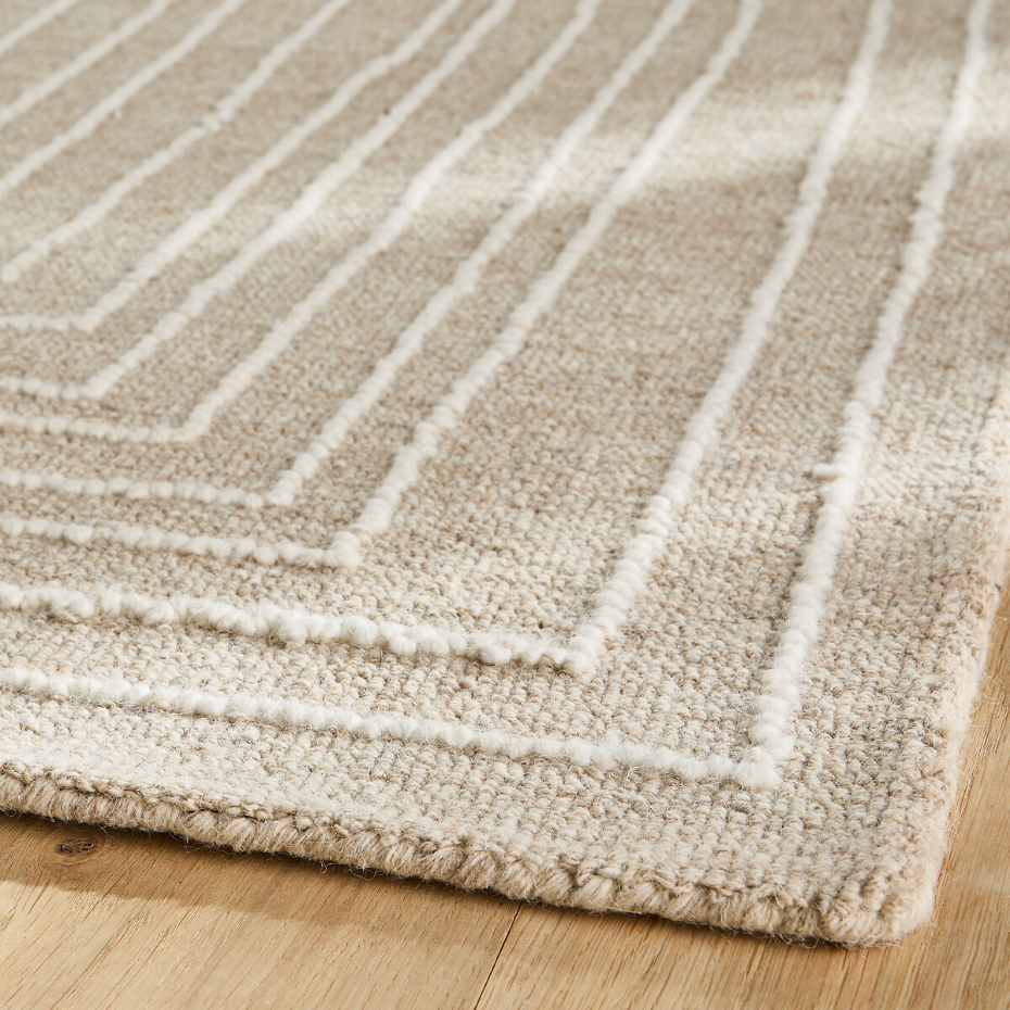 Tapis tufté main, en laine brodée, Ikar