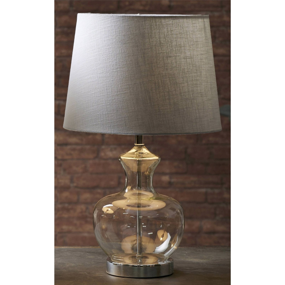 Lampe de table ronde en cristal et métal