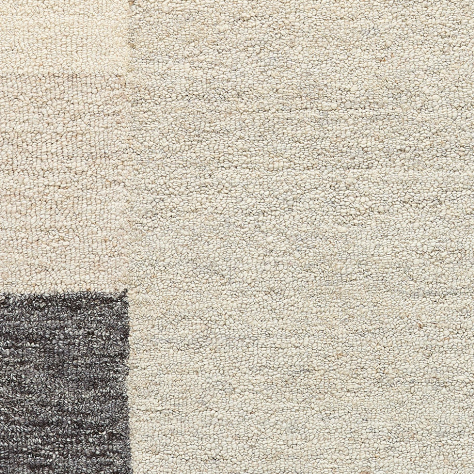 Tapis en laine tufté main aux couleurs douces et bordures